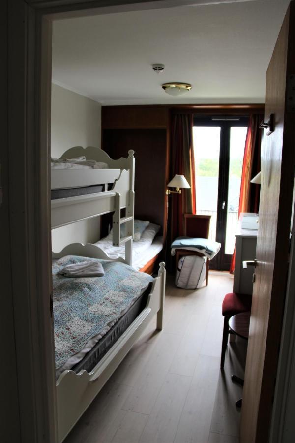 Sanderstolen Hotell Bagian luar foto